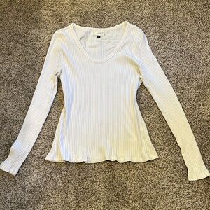 Large long sleeve cream shirt.